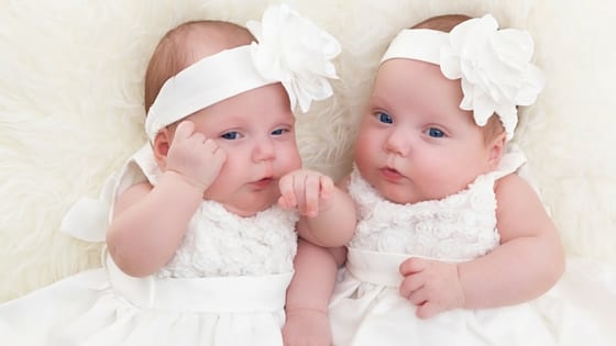 baby twins at baptism reception party